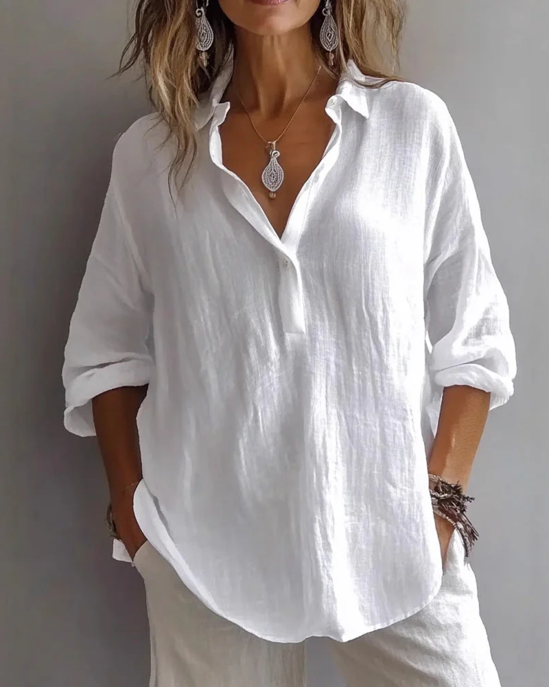 Blusa Holgada con Cuello en V y Mangas Ajustables
