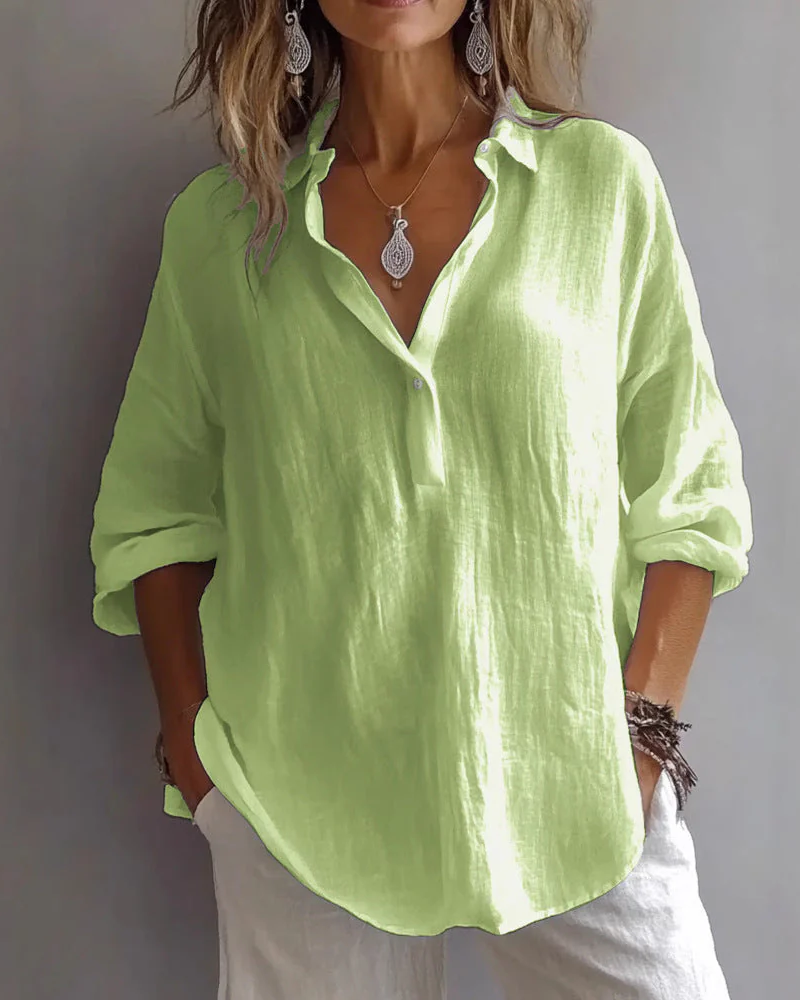 Blusa Holgada con Cuello en V y Mangas Ajustables